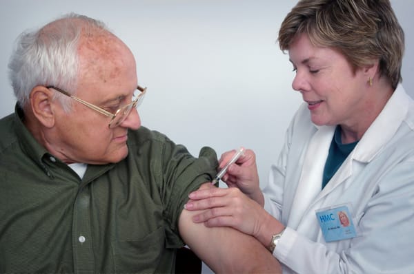 Older man getting vaccination